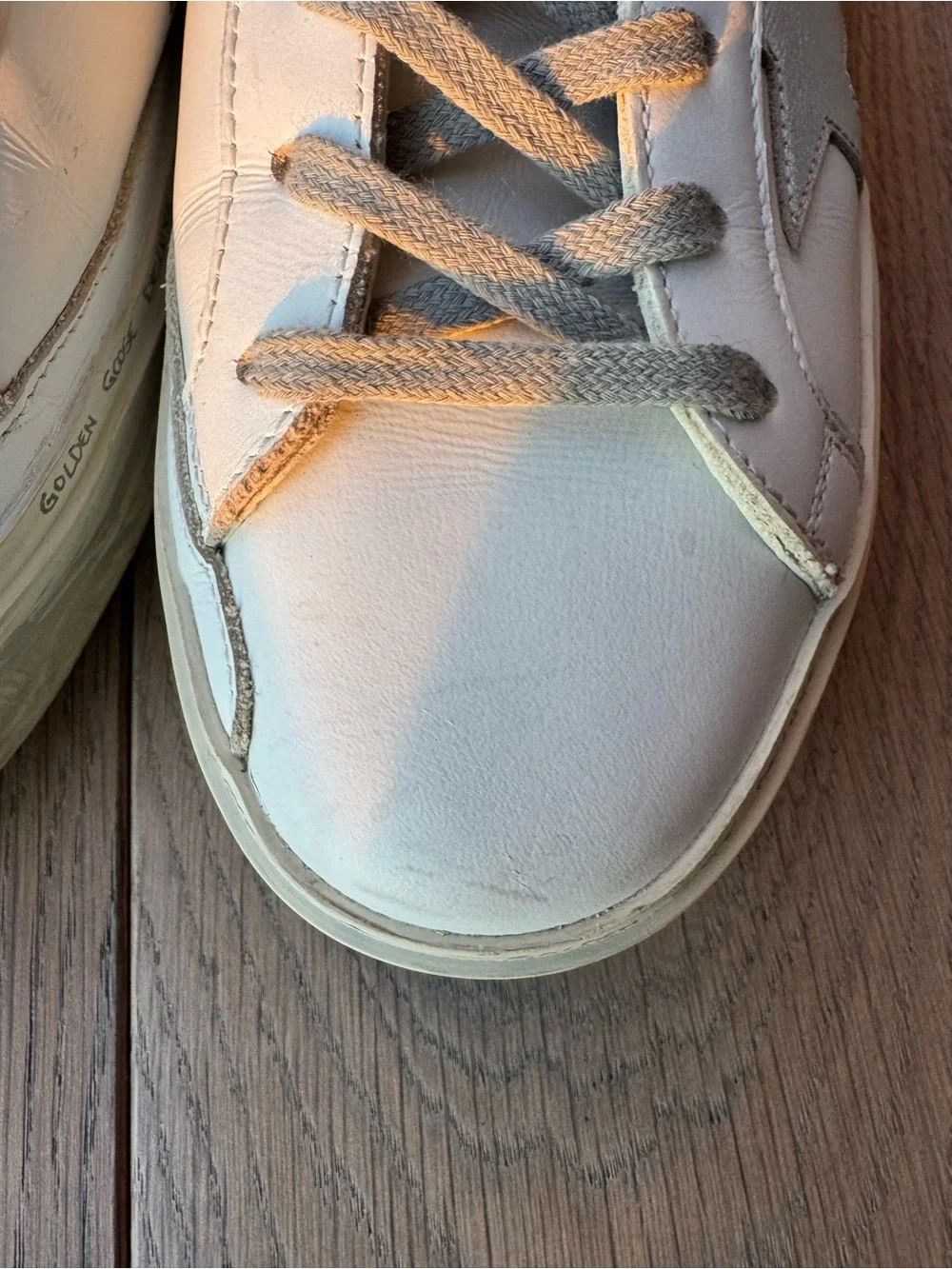 Golden Goose Hi Star with silver star and metallic silver heel